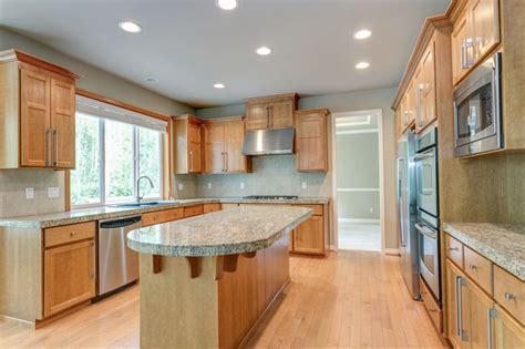 steel grey leathered with honey oak cabinets|honey oak cabinets green.